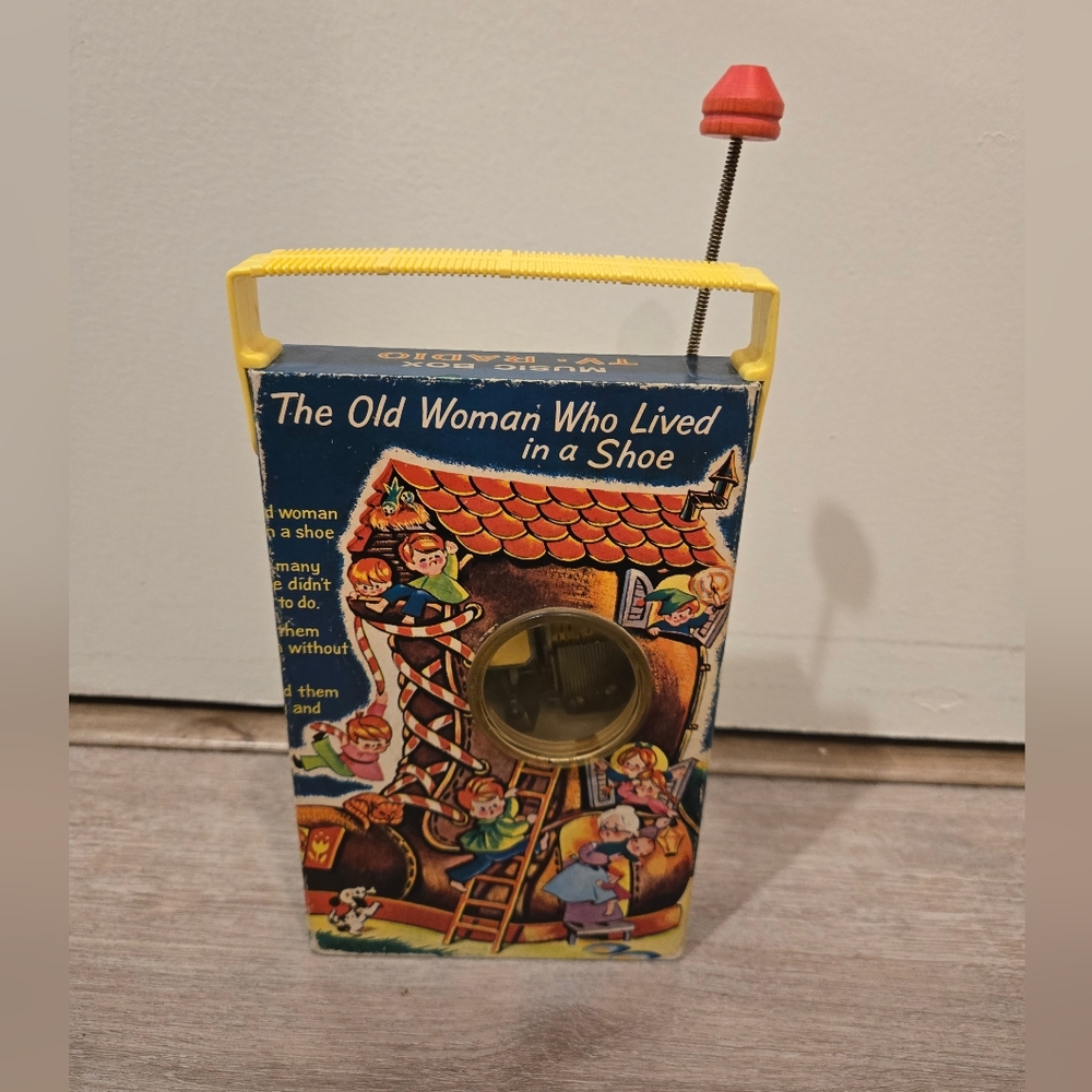 Vintage Fisher Price 'The Old Woman Who Lived in a Shoe' Wind-Up Toy Radio